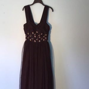 Full length black dress.